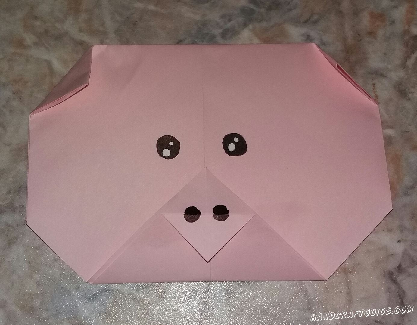 Мордочка поросенка из бумаги, с помощью техники оригами подарит хорошее настроение на целый день 