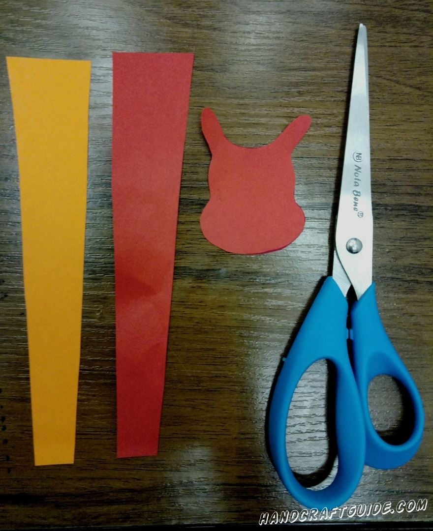 We cut out all the necessary details from colored paper, as in the photo.